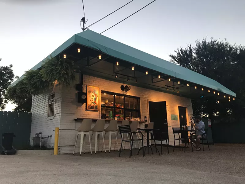 Image: Bring a bottle of wine and grab a seat in front of West Dallas' sweetest taco window.