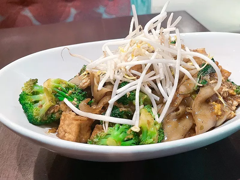 Image: The Pad See Ew is wok-tossed with broccoli florets and a sweet soy sauce.