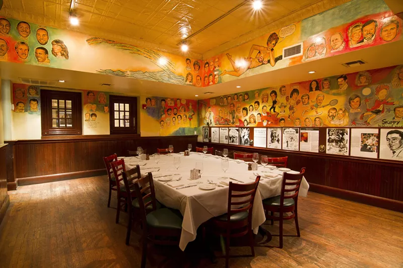 Image: The Palm — with its famous caricatures of regulars — is leaving the West End, and owners cited safety concerns when announcing the closure. But management won't say what exactly those safety concerns are.