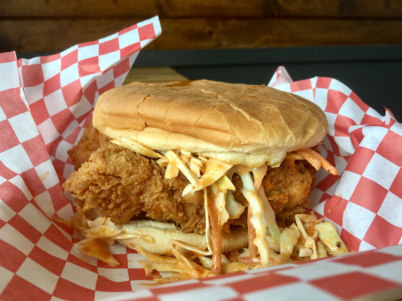 Mike's Sandwich at Mike's Chicken, fried chicken tenders under spicy cole slaw for $4.79