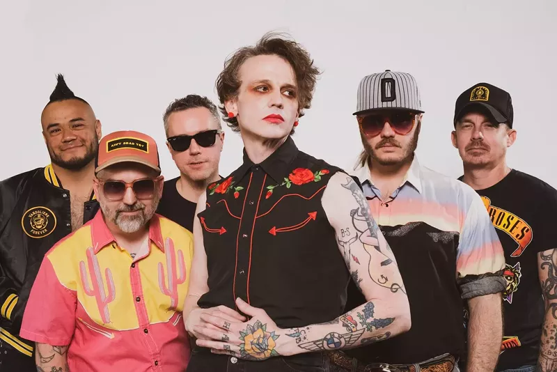 Image: Band is posing for a picture