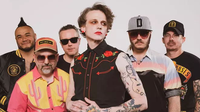 Band is posing for a picture