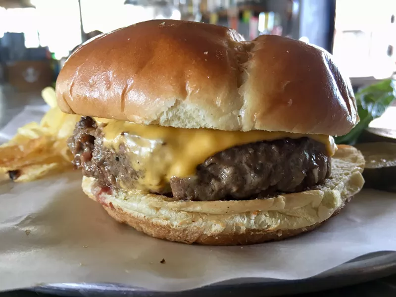 Image: The single cheeseburger at Cold Beer Co., with a Wagyu-style beef patty that's been blended with bacon, is $8.