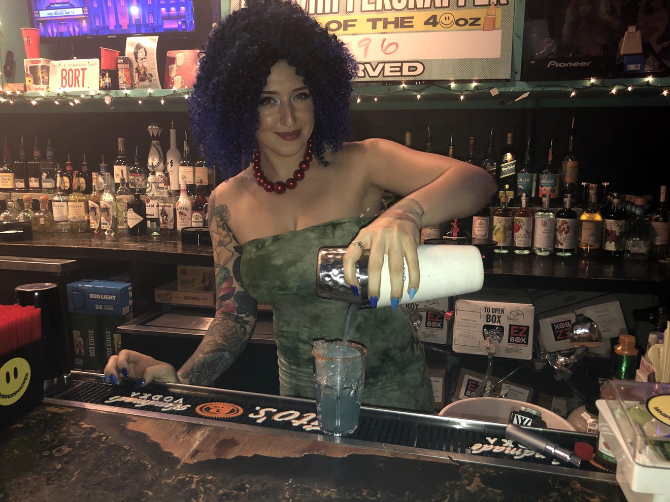 Bartender Kristen "Marge" Johnson mixes a Flaming Moe at the Whippersnapper's newest Simpsons-themed pop-up bar.