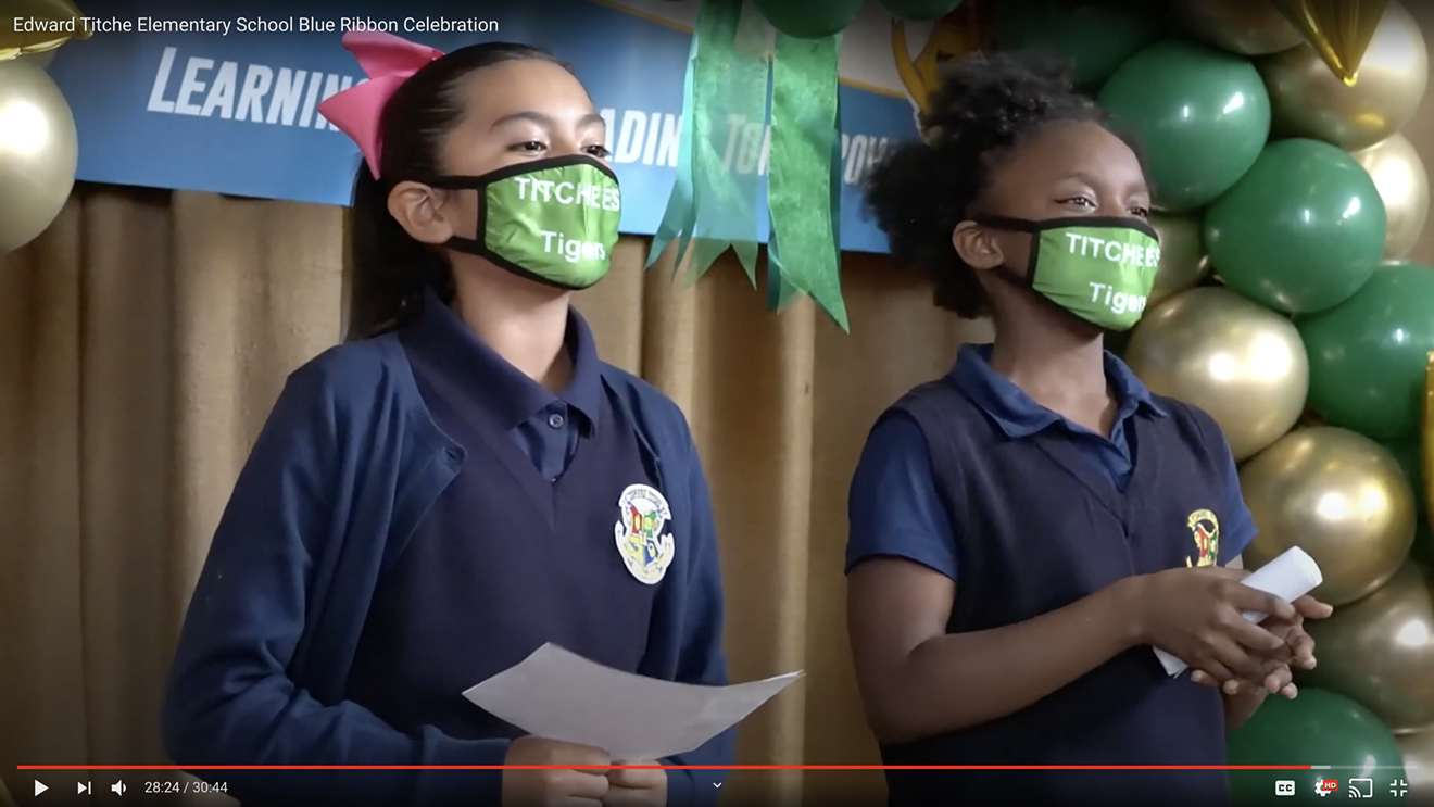 Titche Elementary students Isabella Rocha (left) and Ja’Zariya Mouncil speak during Thursday's celebration.
