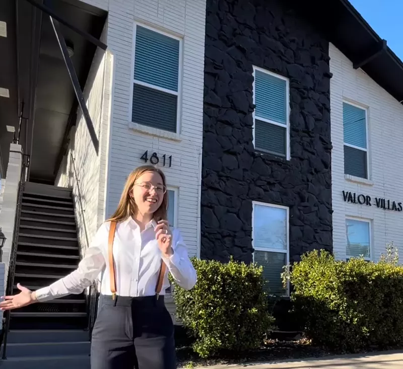 Image: Dallas realtor Sara Williams stands in front of a white house. She's going viral on TikTok for her fun renatl videos,