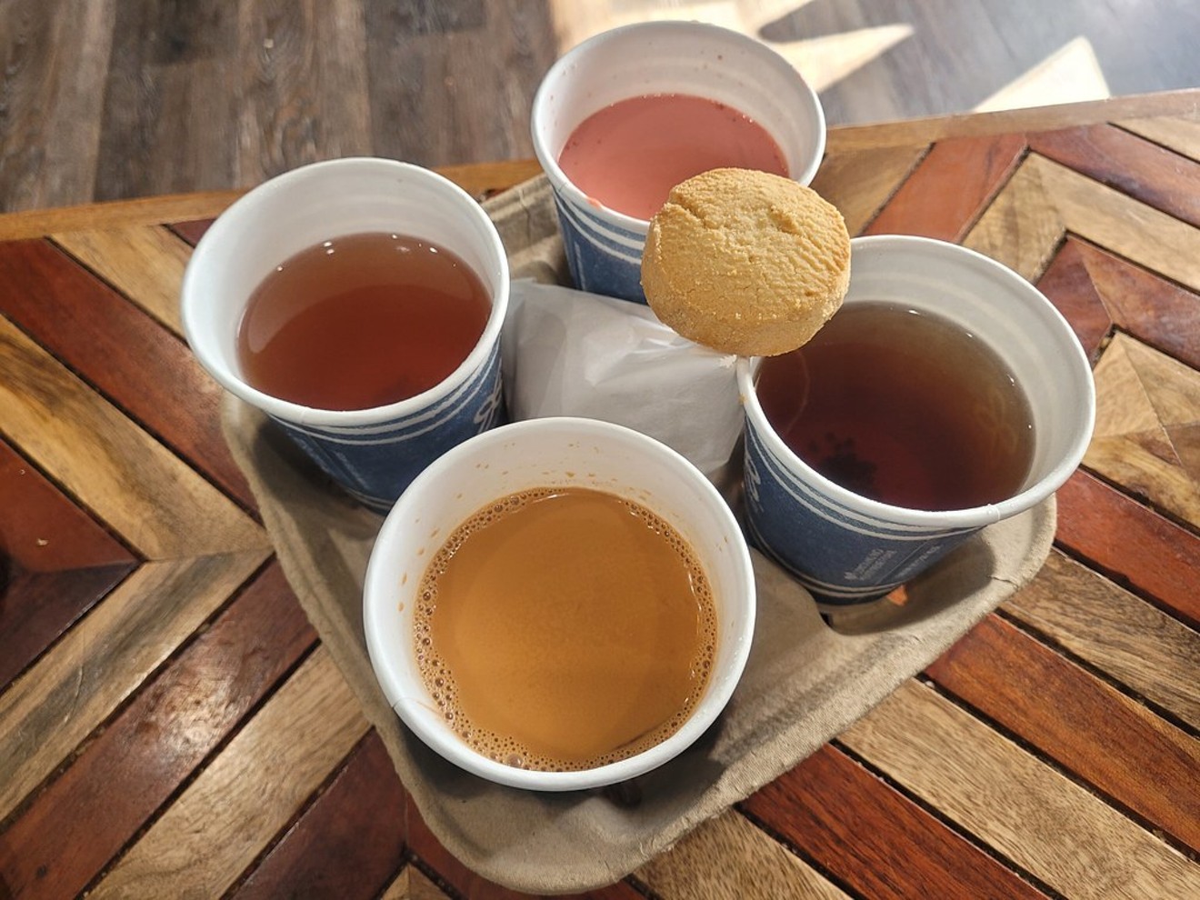 Chais, clockwise from upper Left: Irani chai, Kashmiri chai, Peshawari kahwa and signature chai