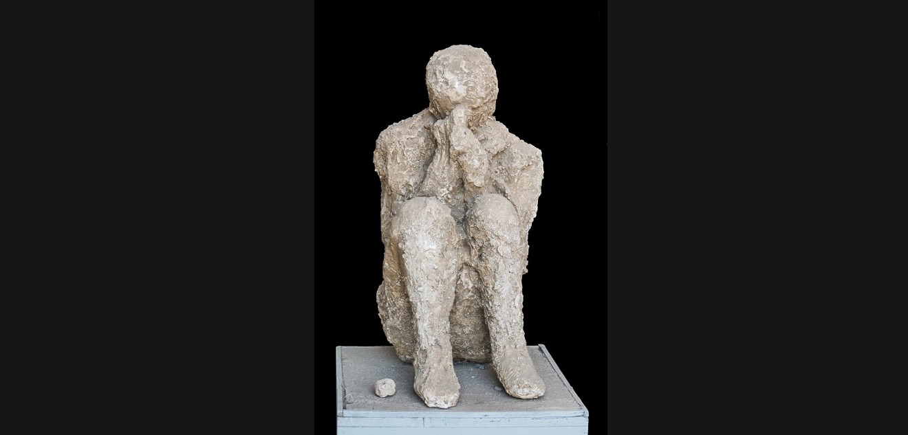 Cast of a sitting figure from the eruption of Mount Vesuvius in 79 A.D.