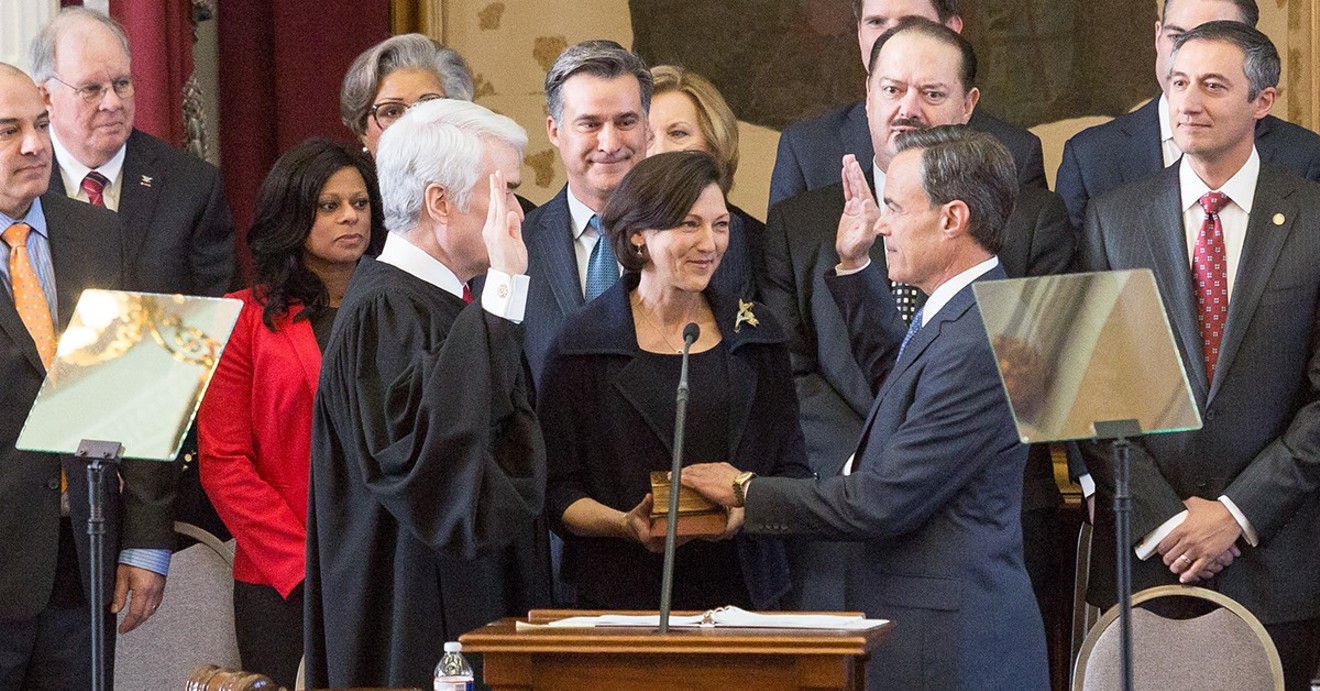 Joe Straus, with his hand on the Bible, was sworn in as speaker of the Texas House in January.