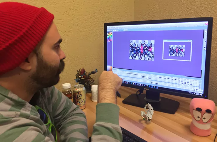 Artist Alfonso Callejas demonstrates the animation software he used to create the Stranger Things game's final boss. - DANNY GALLAGHER