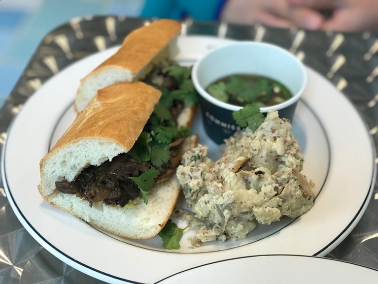 Commissary's French dip ($10) is accented by Vietnamese flavors highlighted by the pho broth served in lieu of au jus. - BETH RANKIN