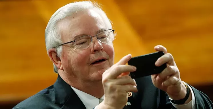 Dear Apple: My iPhone is stuck on selfie, and at the worst times! Sincerely, Joe B. - JONATHAN ERNST/REUTERS/NEWSCOM