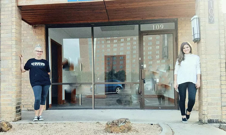 Goldapp and Improv for Life program director Andrea Kyprianou Baum stand outside the Manufacturing Street space they hope to turn into a theater with a $30,000 Kickstarter campaign that's underway. - COURTESY STOMPING GROUND COMEDY THEATRE