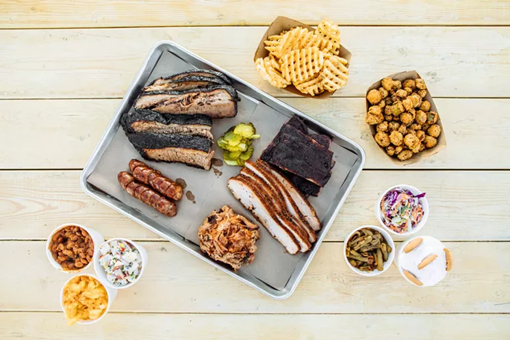 Brisket, links, turkey and more with all the fixins — like fried okra and waffle fries — at Ferris Wheelers. - KATHY TRAN