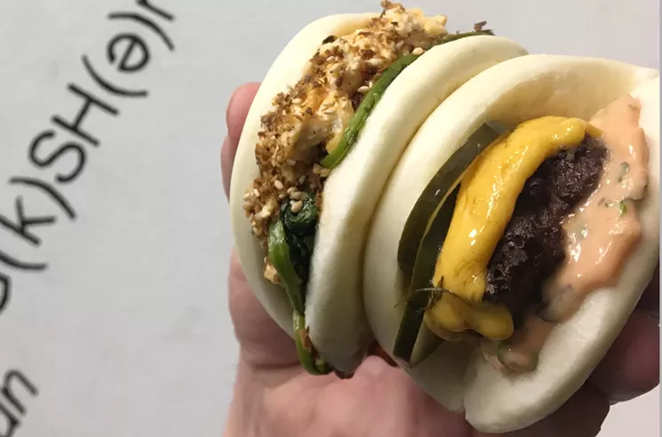 The beef burger bao (right) is topped with American cheese that's made in house at Junction Craft Kitchen. - BUN STOP