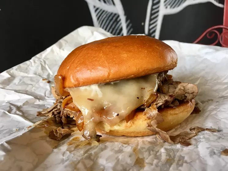 Shaved beef tenderloin, Monterey Jack and paprika-dusted onions at One90 Smoked Meats for $15. - NICK RALLO