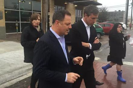State Rep. Rafael Anchia (left) heads to the Texas Theatre with O'Rourke during a brief tour of the local businesses along Jefferson Boulevard. - DANNY GALLAGHER