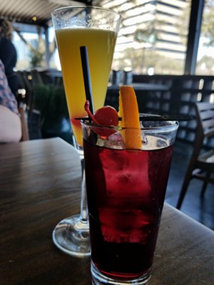 Super-sweet sangria and a mimosa, both $3. - KATHRYN DEBRULER