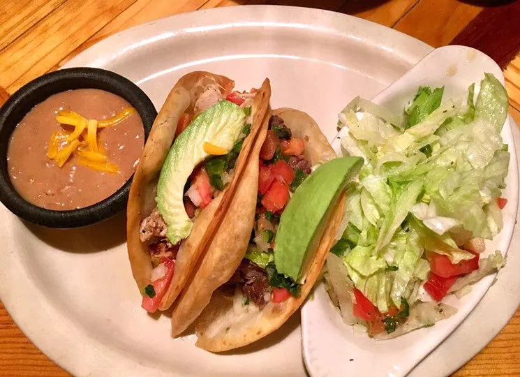 Desperados has been serving stick-to-your-ribs cuisine — like these tacos on deep-fried tortillas — for more than 40 years. - NICK RALLO