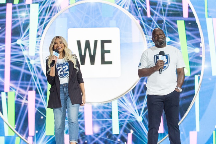 Pat and Emmitt Smith offered some inspiring words for a crowd of kids at the WE Day Celebration on Tuesday. - KAT SPENSER FOR WE DAY