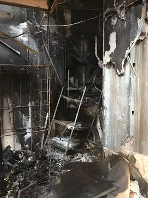 A piece of wood lodged under a grease pan led to the fire that closed Smokey John's in September. - COURTESY SMOKEY JOHN'S BBQ