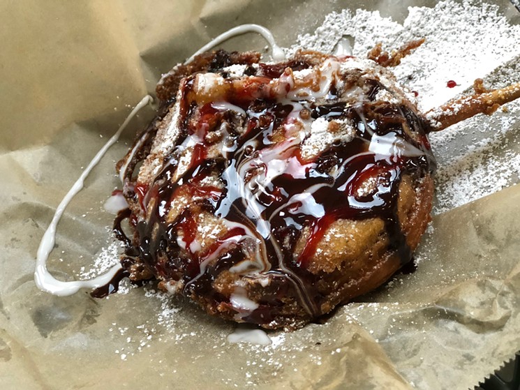 Behold, the Seventh-Inning Cinnamon Roll, a new menu item on deck this baseball season at Globe Life Park. - PAIGE WEAVER