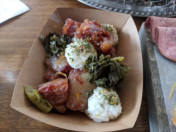Pigtails at Petra and the Beast, with "Louisiana-style" rice balls and pickled mustard greens. - BRIAN REINHART