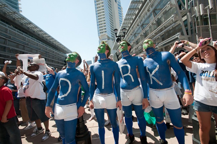 Fans of Dirk Nowitzki in blue as the Dallas Mavericks kicked off their parade through Dallas at the Dallas Convention Center in 2011. - MIKE MEZEUL