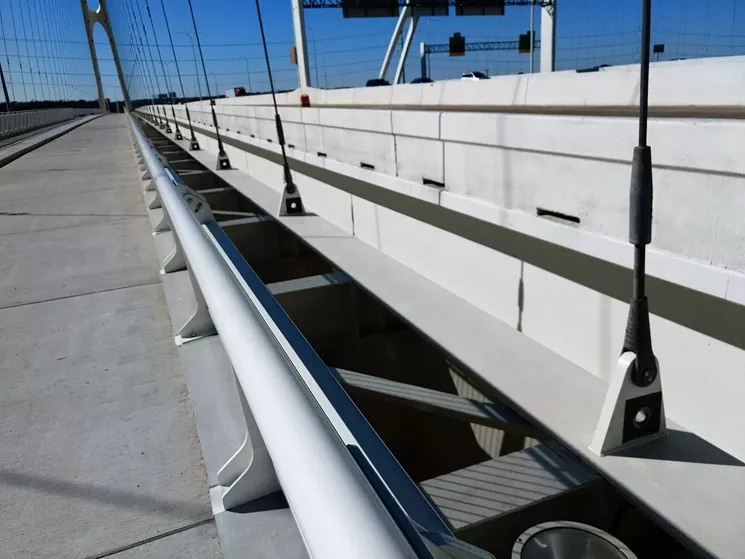 The bicycle lanes hooked to the edges of the I-30 freeway bridges, hanging from mile-high arches, seem to be dangerously jangly-bangly. - JIM SCHUTZE