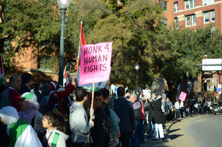 Pro-Palestinian protesters march on Dealey Plaza. - JACOB VAUGHN