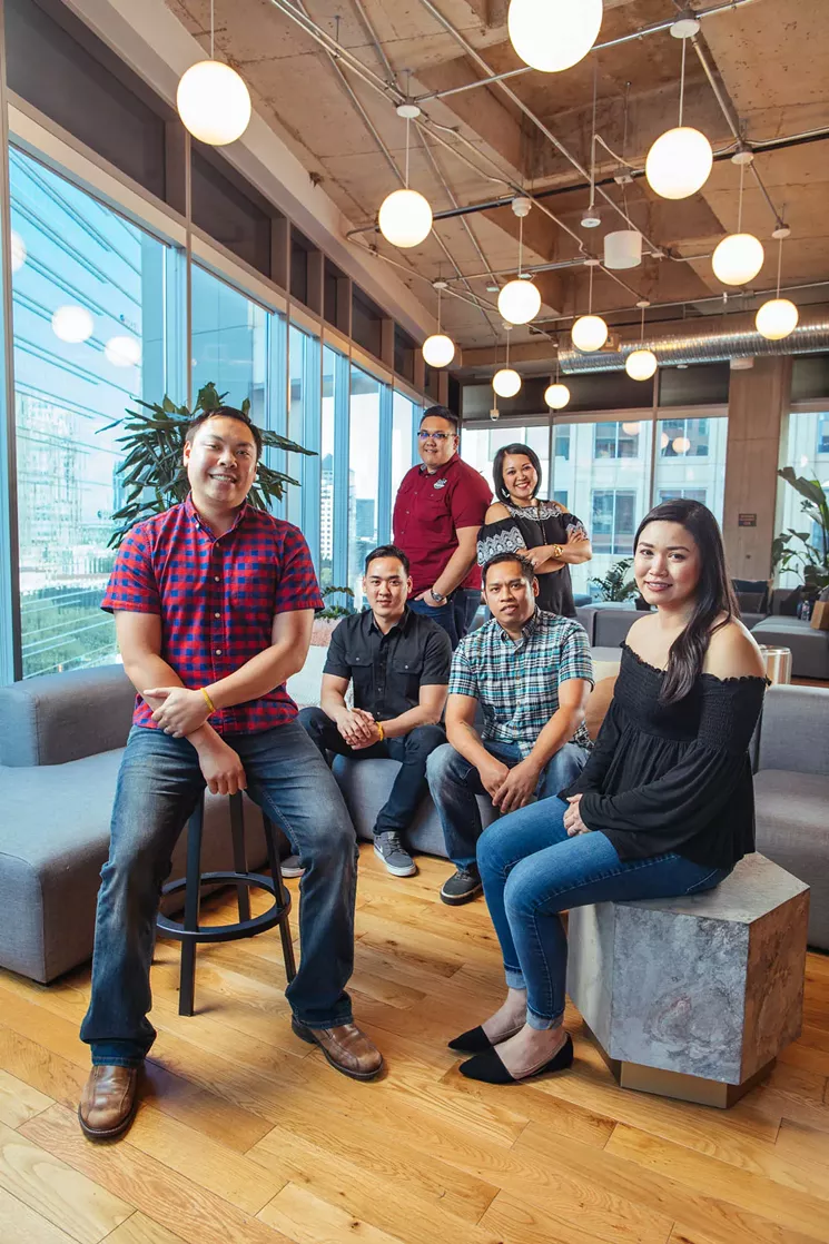 The team at Saap Lao Kitchen (from left to right): Frank Chanthorn, Elson Douangdara (bottom), Cliff Douangdara (top), Kim Chanthorn (top), Frick Chanthorn (bottom), Sandy Sichanh - KATHY TRAN