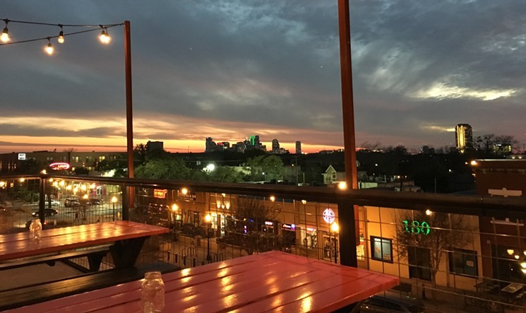 HG Sply Co.'s rooftop patio is a stunning spot for frosé and people-watching. - SUSIE OSZUSTOWICZ