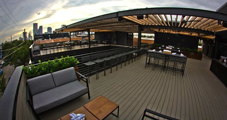 The rooftop has plenty of space to entertain and enough booze to make it entertaining. - AUSTIN MARC GRAF