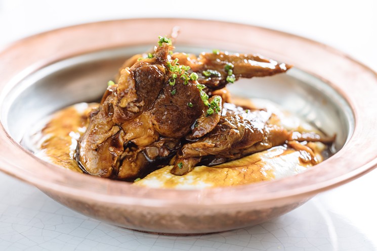 Hunkar begendi ($15), slow-cooked lamb shank on a puree of torched eggplant and Turkish cheese. - KATHY TRAN