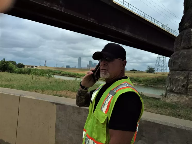 A security person or construction supervisor, name unknown, called his superiors to ask instructions when the Observer showed up without permission. - JIM SCHUTZE