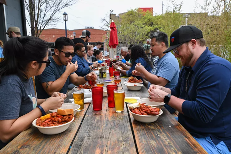 You're likely to share a table with a stranger at BrainDead Brewing, and that's intentional. - MELISSA HENNINGS