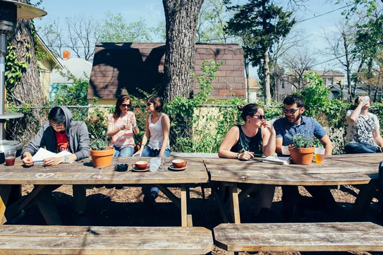Wild Detectives in Oak Cliff features communal seating and turns off Wi-Fi on the weekends to encourage people to unplug. - KATHY TRAN