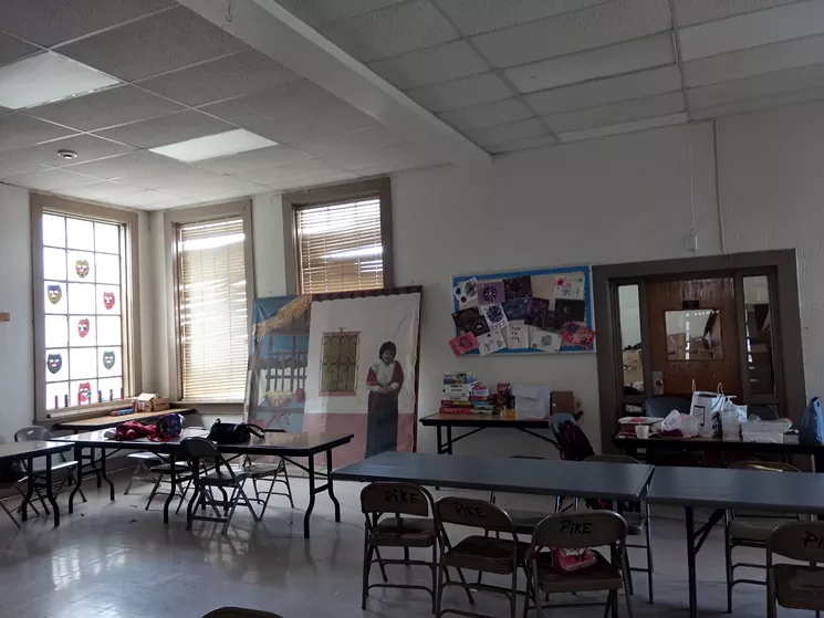 Pike Park Rec Center — a greasy-walled, dimly lighted, depressing central meeting room where most of the children's programs take place. The rest are held in the basement, which — don't even ask. - JIM SCHUTZE