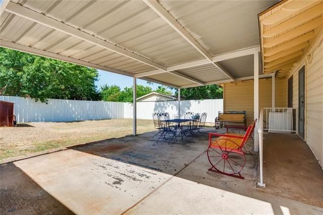 The house's spacious backyard patio was the setting for Stevie Ray Vaughan's earliest years. - REALTOR.COM