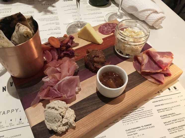 Go for the boards at Sixty Vines, like this salumi and cheese plate ($21). - TAYLOR ADAMS