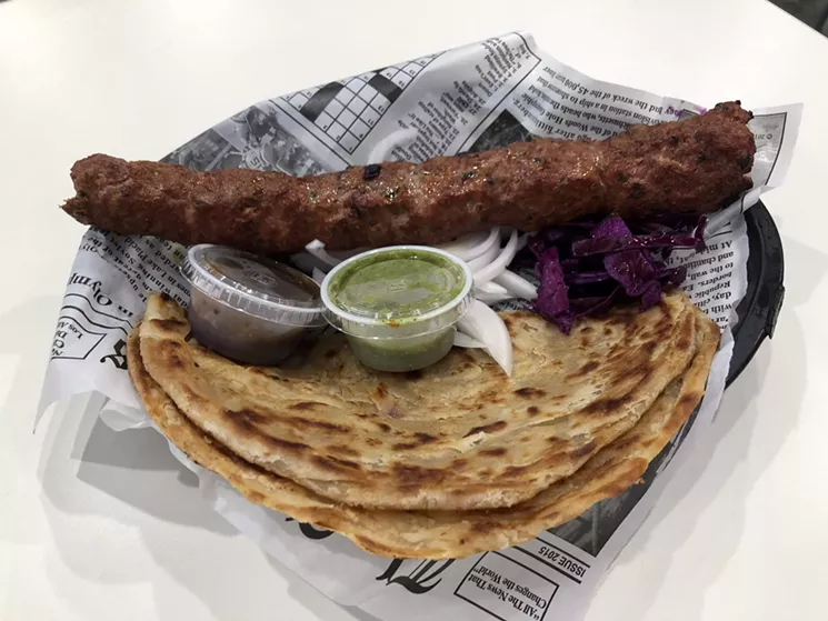 Gulabo's barbecue basket with dangal kebab, mint jalapeno sauce, tropical tamarind sauce and laccha paratha. - PAIGE WEAVER