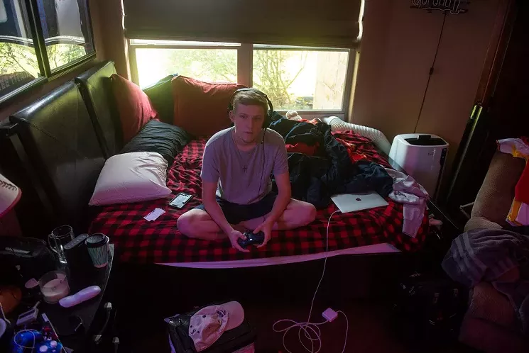 Blake Novacek says injuries he suffered in a fraternity hazing have left him a virtual recluse. He has dreams of being a sports broadcaster. - BRIAN MASCHINO