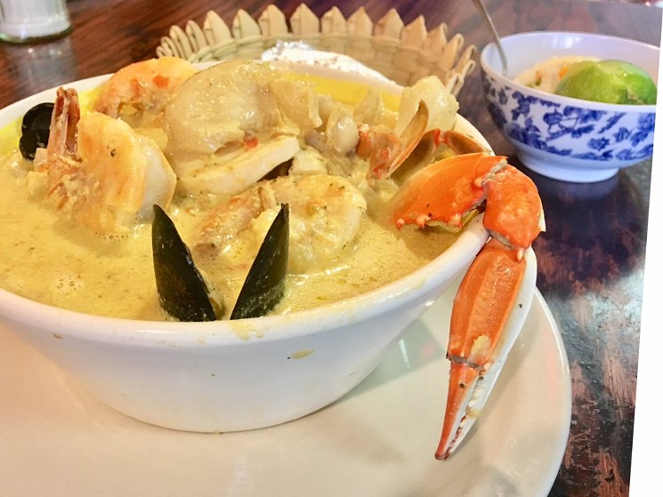 Sopa de caracol, a conch soup with an array of seafood in a smooth coconut milk broth. - AMANDA ALBEE
