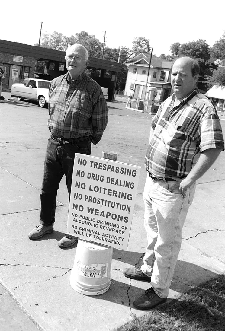 Dale Davenport, right, and his father, Freddy, have been fighting crime on Martin Luther King Jr. Boulevard for 15 years. - MARK GRAHAM
