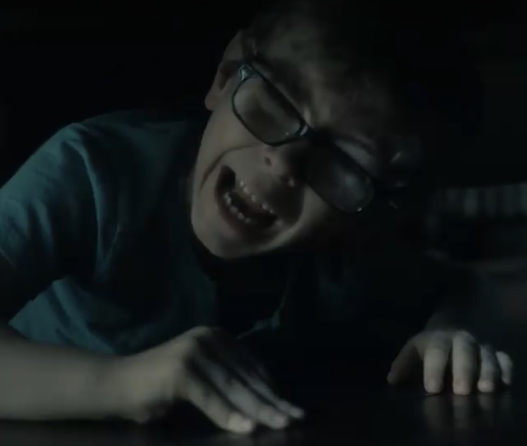 Julian Hilliard plays the younger Luke Crain, who encounters some scary specters in the Netflix horror series The Haunting of Hill House. - COURTESY NETFLIX