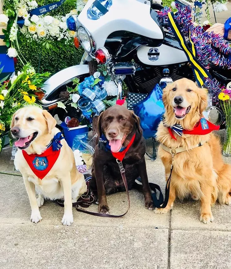 Brisbane (far right) and two more members of Brisy's Bowties attended a candlelight vigil of DPD Sr. Corporal Jamie Givens. - BRISY'S BOWTIES