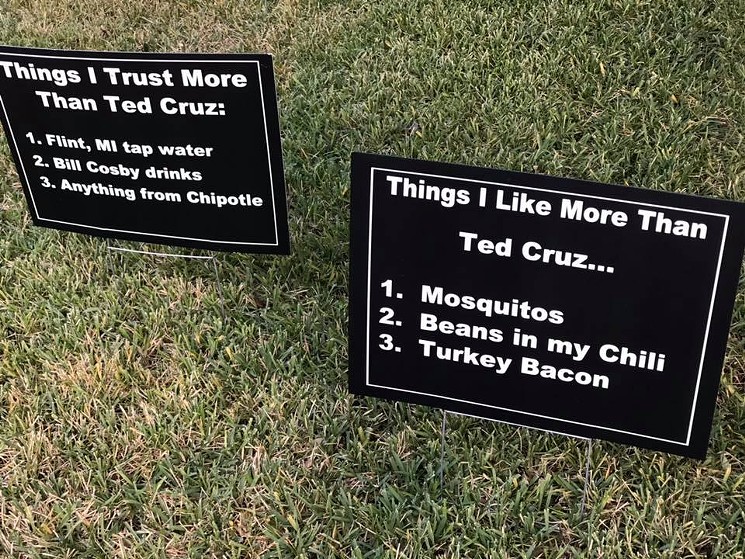 Oak Cliff resident John Bradley spotted these signs in a Kessler Plaza neighbor's front yard. - COURTESY JOHN BRADLEY