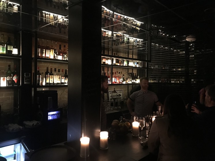 It's dark in here, but there's plenty to drink — and you can order food off Harlowe MXM's menu. - BETH RANKIN