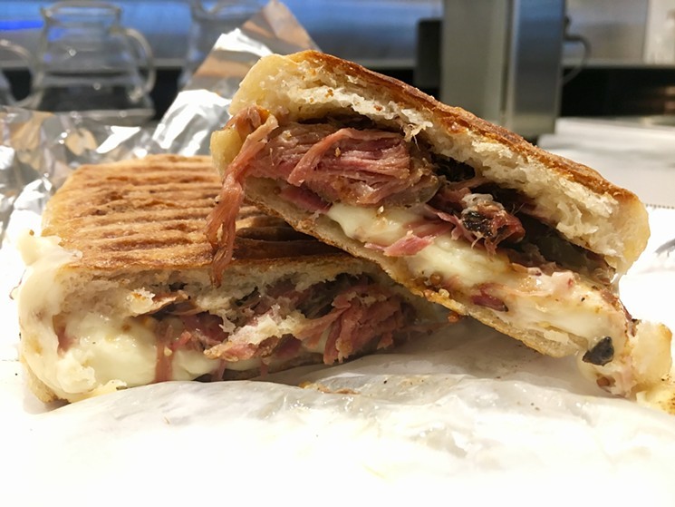 A Texas spin on the Cuban, with Pecan Lodge pork, Tasso ham, Muenster, house pickles, whole grain mustard at Civil Pour ($11). - NICK RALLO