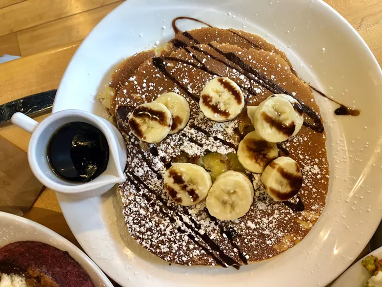 Chocolate and banana may be one of the best combinations, and Yolk dives in to that idea with an addition of peanut butter in the Nutty Monkey Pancakes ($12.50). It’s one of those names you don’t want to say out loud, but you forget about it once you take a bite. - TAYLOR ADAMS